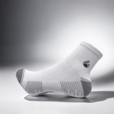Ankle white and grey running sock with seamless toe and breathable mesh panels.